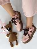 Peach suede platform sneakers with brown teddy bear embroidery and dark brown laces and sole