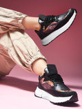 BLACK women's chunky sneakers with snakeskin texture, floral sequin panels, white platform sole, lace-up front