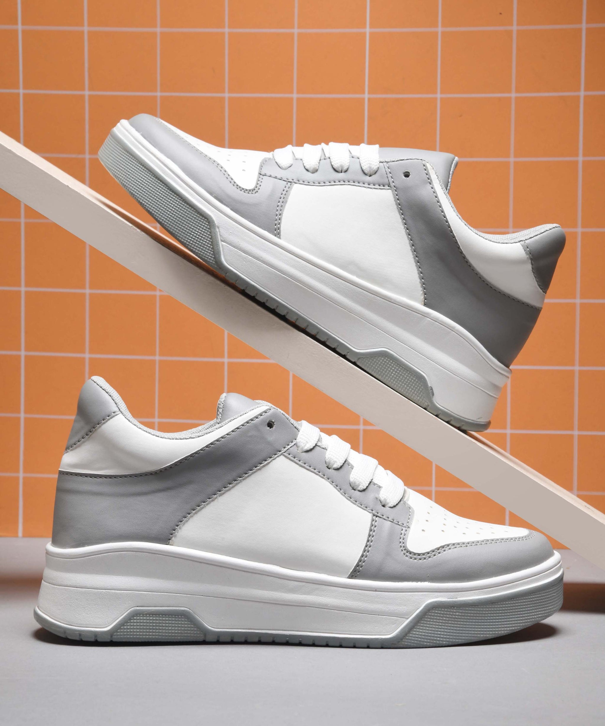 platform lace-up sneakers with a two-tone design and a chunky sole  Grey