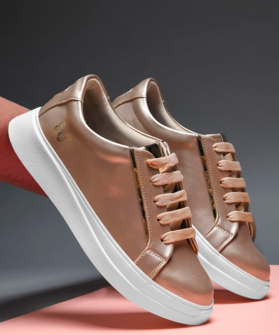 Rose Gold Metallic Sneakers for Women with lace-up closure gold butterfly logo and chunky white sole