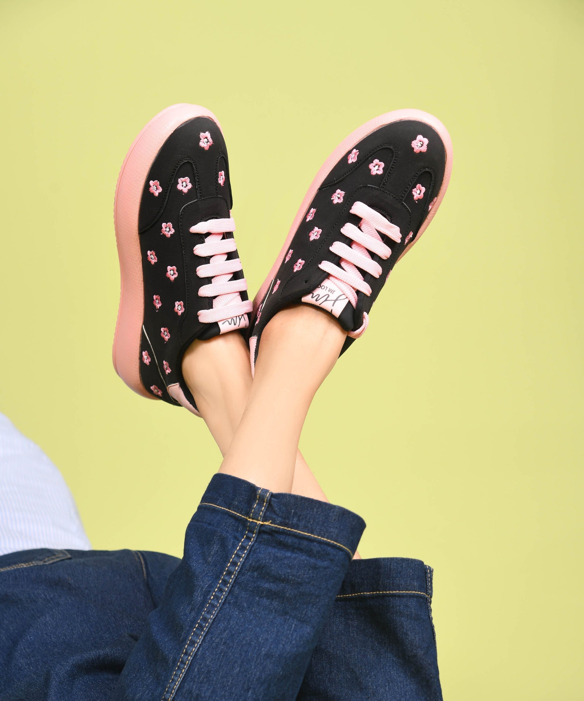 Black suede sneakers for women with embroidered flowers, lace-up front and platform sole