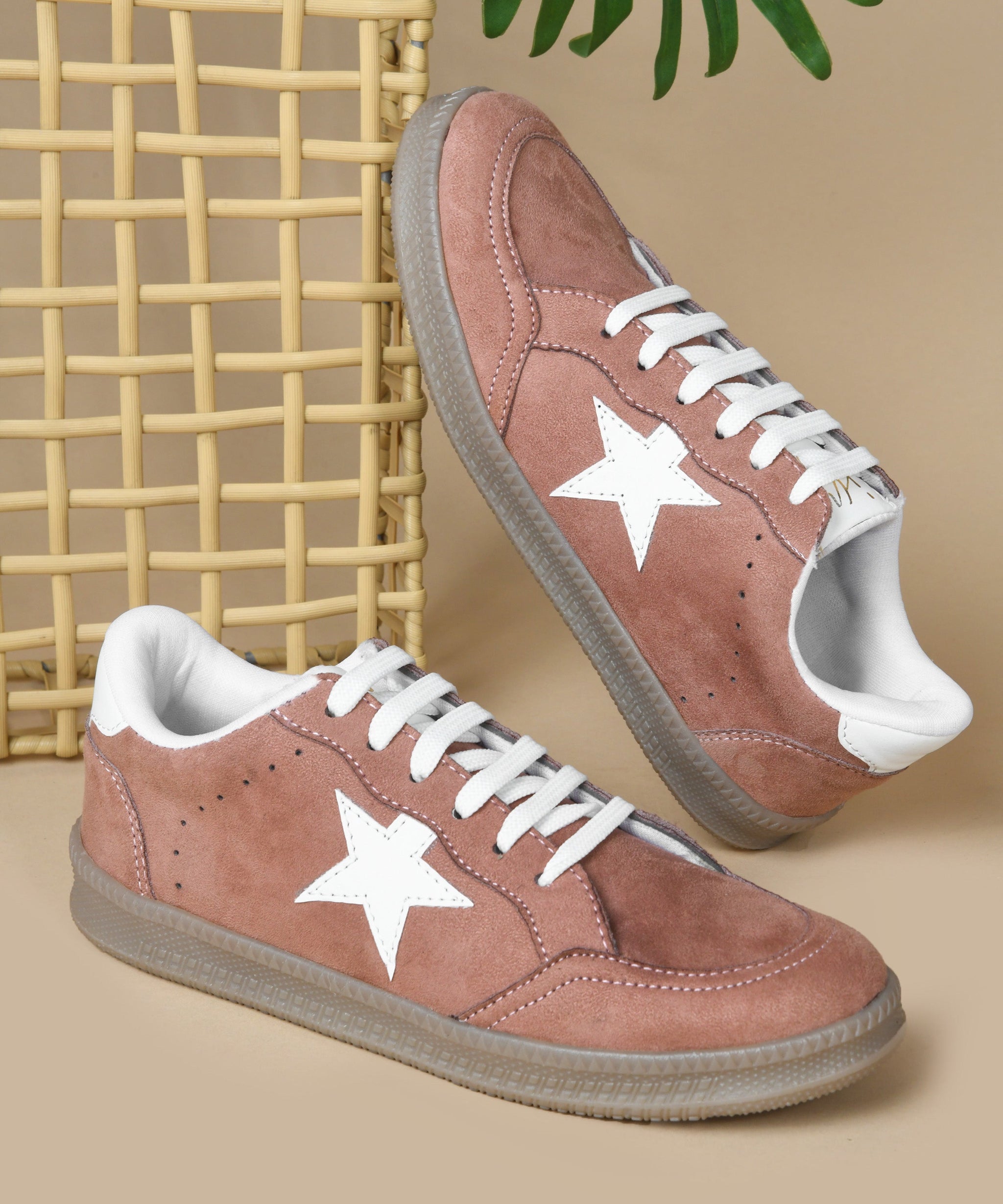 Peach star sneakers women, suede lace-up shoes with white star detail and gum sole.