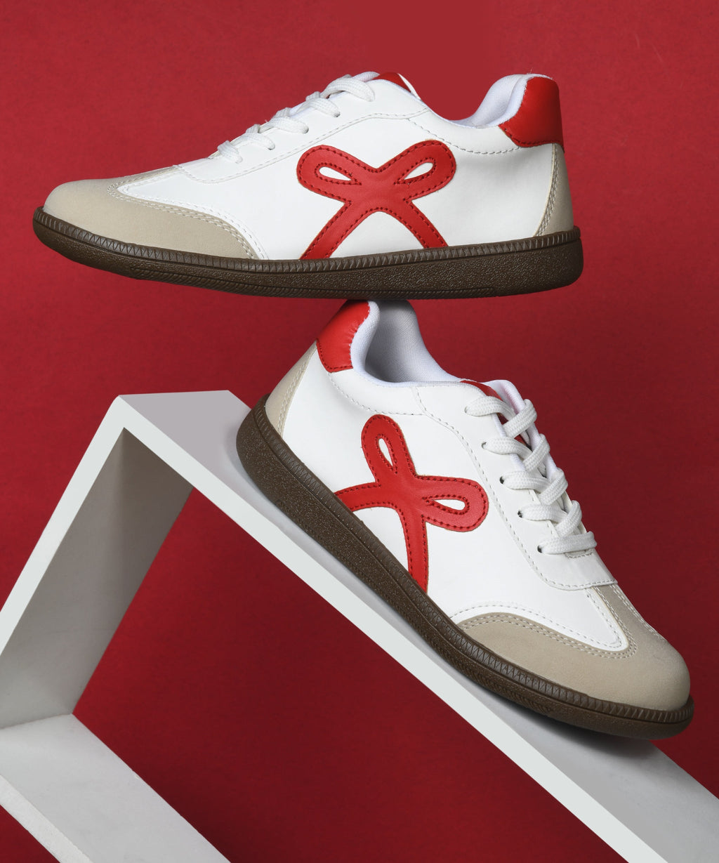 Bow sneakers for women in Red-White, lace-up design featuring ribbon applique, cushioned collar, and rounded rose toe cap.