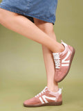 Peach casual sneakers for women featuring white side stripes retro low-top design and brown gum sole