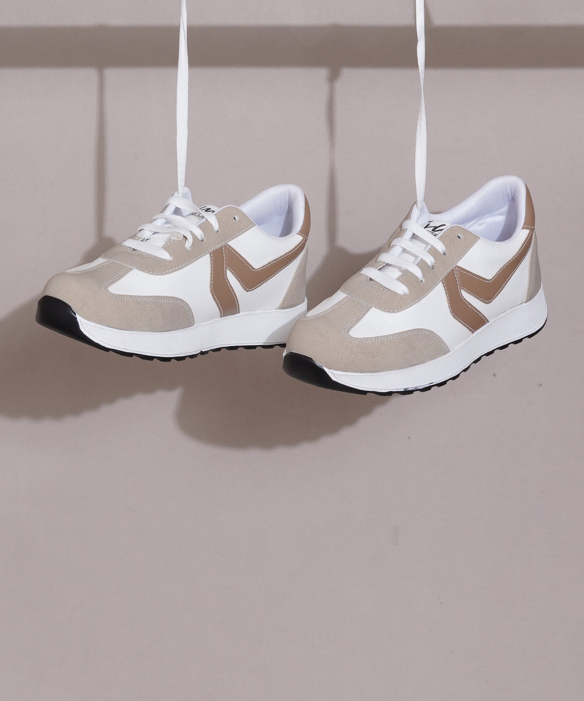 Beige-White women's sneakers in white, beige, and tan with lace-up design and chunky white sole