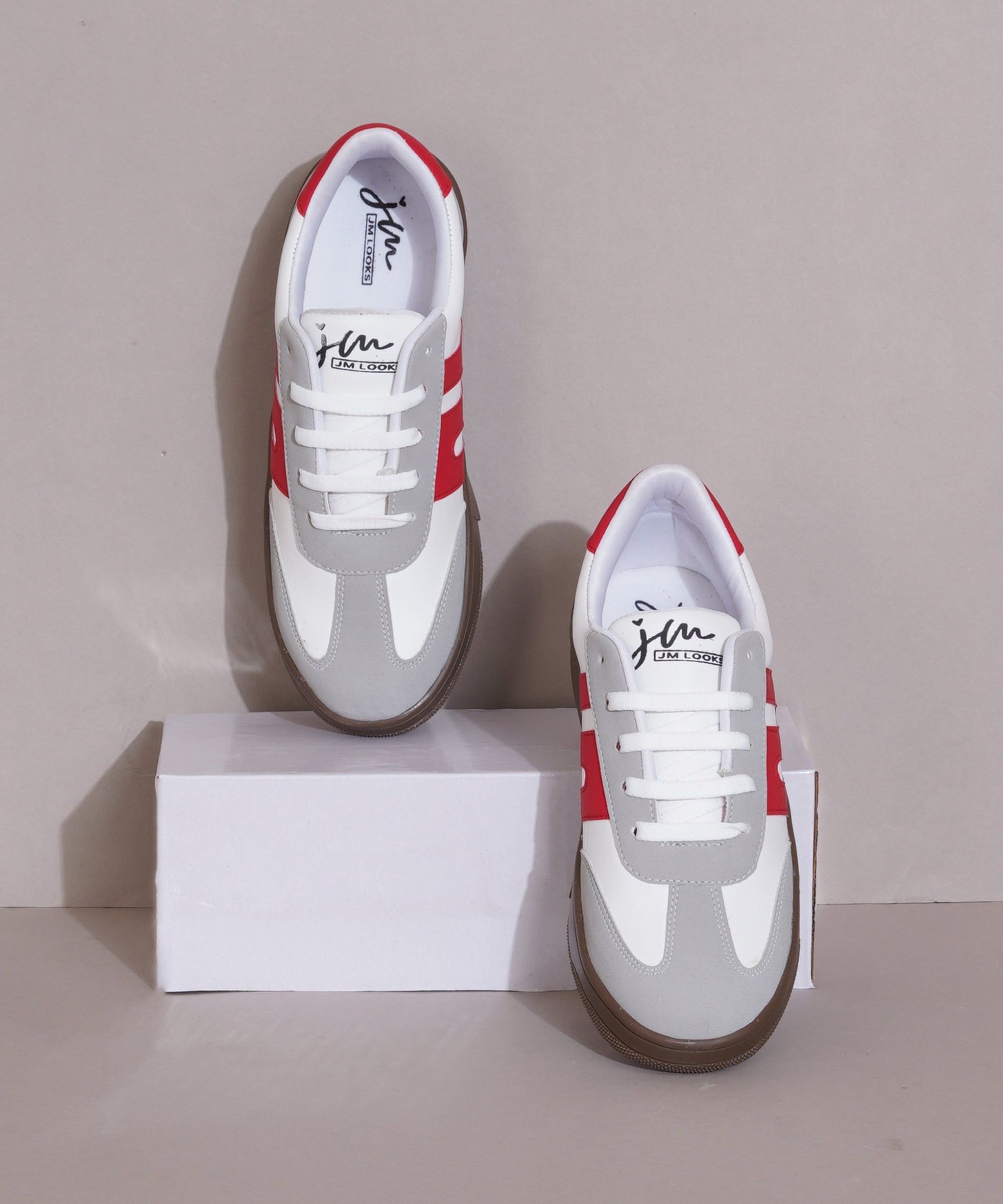 Grey-Red sneakers for women with white side stripe, gum sole, lace-up front, and padded collar.