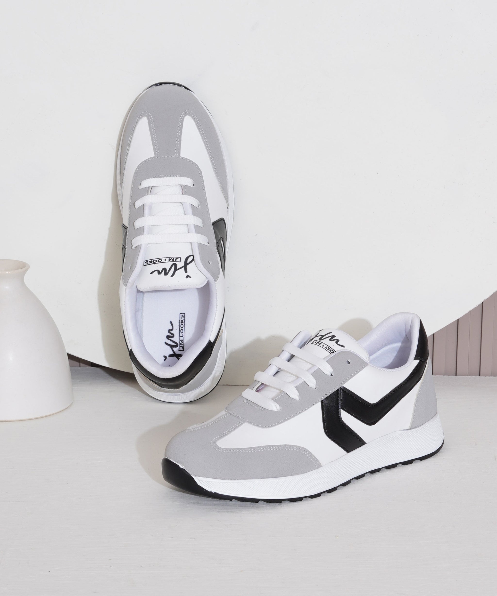 Black-White women's sneakers in white, beige, and tan with lace-up design and chunky white sole